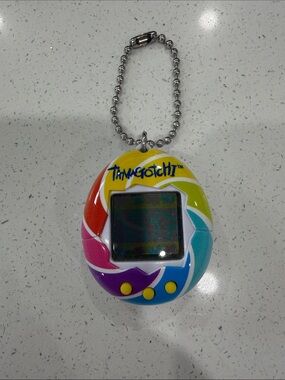 Tamagotchi Multicolor Virtual Pet Keychain - Rainbow